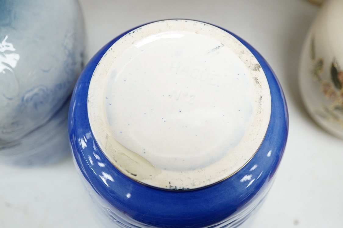 Three pairs of vases to include hexagonal Wilton ware and Delft blue and white, largest 26cm high
